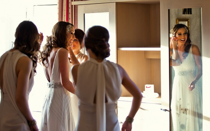 bride getting ready with bridesmaids